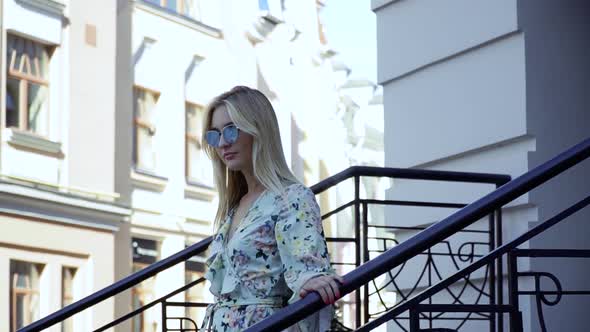 Beautiful Girl Walking the City Street