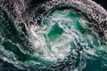 Blue waves of water of the river and the sea meet each other during high tide and low tide. - PhotoDune Item for Sale