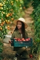 Sitting, taking vegetables. Little girl is in the garden with tomatoes - PhotoDune Item for Sale