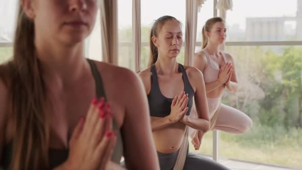 Girls Meditating During Aero Yoga