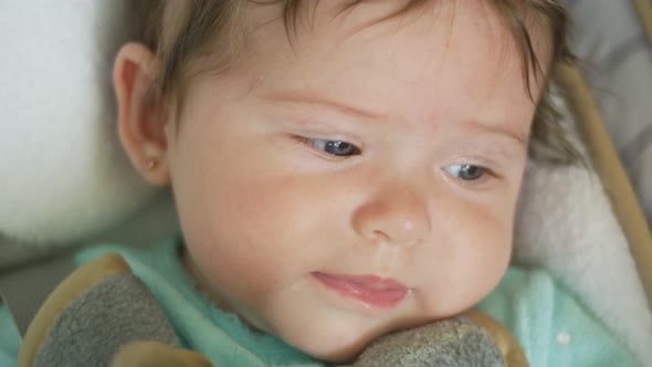 Beautiful Closeup in Slow Motion of Baby Going From Happy to Sad