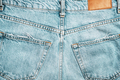 Back of light blue jeans close-up. Trendy casual wear. - PhotoDune Item for Sale