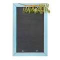 Black empty chalk board in a blue frame, decorated with a branch of sea buckthorn - PhotoDune Item for Sale