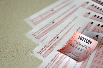 th numbers for marking to play lottery. Lottery playing concept or gambling addiction. Close up photo