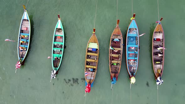 Aerial Downward View of Beautiful Long Tail Boats in Andaman Sea Thailand