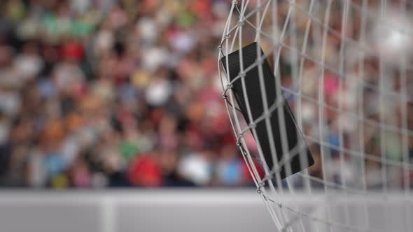 Ice Hockey Puck Hits Goal Net