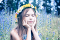 Close up portrait of a beautiful girl with flower wreath - PhotoDune Item for Sale