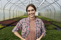 Portrait of female greenhouse plantation worker - PhotoDune Item for Sale