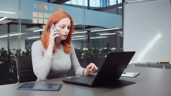 Female Financial Advisor Giving Consultation on Phone