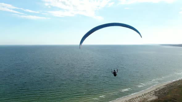 Aerial Footage of a Paraglider Flying, View on the Sea, Extreme
