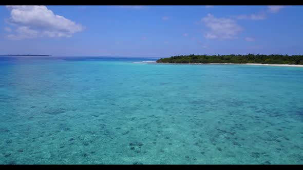 Aerial above travel of perfect seashore beach lifestyle by blue water with white sand background of 