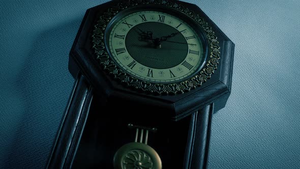 Old Wall Clock In The Dark Angled Shot