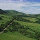 Road in the Green Valley Between Hills - VideoHive Item for Sale