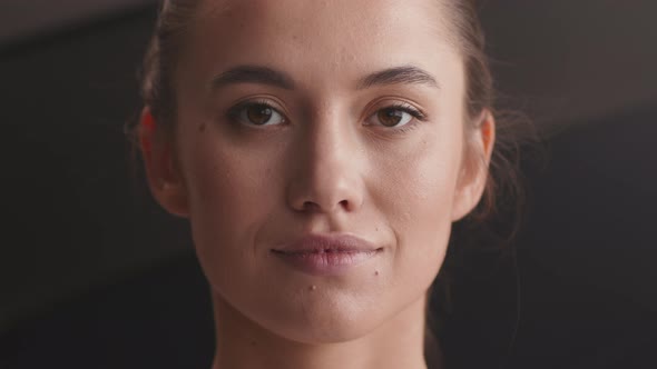 Portrait of Young Pretty Calm Woman Looking at Camera and Blinking Slow Motion