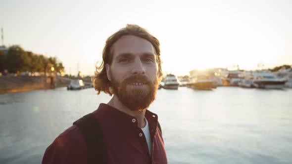 Portrait of Smiling Man near River