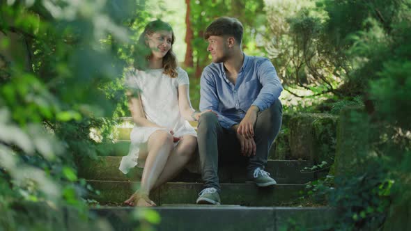 Couple sitting on stairs