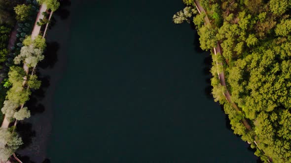 Bird Eye Zoom Descend to Caldera Dark Lake