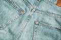 Back of light blue jeans close-up. Trendy casual wear. - PhotoDune Item for Sale