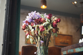 blur cafe background with flower on table , - PhotoDune Item for Sale