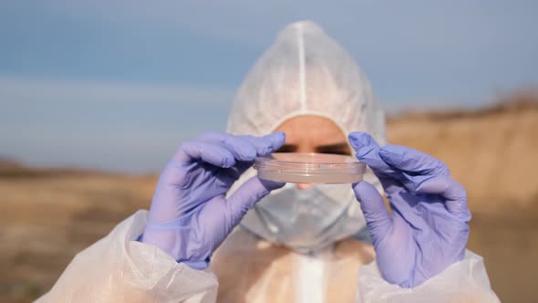 Scientist Use Water Samples From a Reservoir in Test Tubes