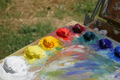 Colorful palette with oil painting and brushes - PhotoDune Item for Sale