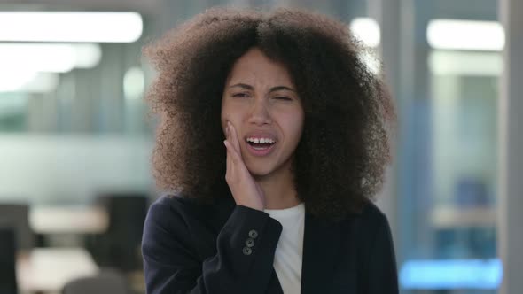 Portrait of African Businesswoman Having Toothache Cavity