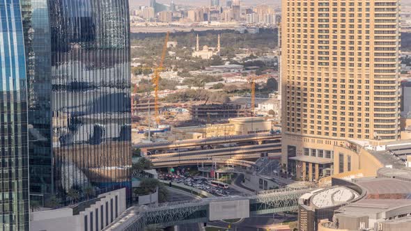 Dubai Downtown Street with Busy Traffic and Skyscrapers Around Timelapse