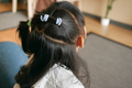 Beautiful ribbon is tied on a child hair  - PhotoDune Item for Sale