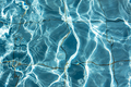 The texture of the pool water. Blue transparent water glows in the sun. - PhotoDune Item for Sale