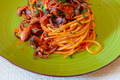 Spaghetti with octopus, tomato, olives and capers. - PhotoDune Item for Sale