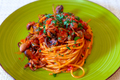 Spaghetti with octopus, tomato, olives and capers. - PhotoDune Item for Sale