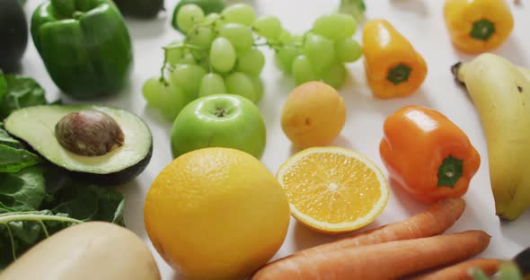 Video of fresh fruit and vegetables on white background