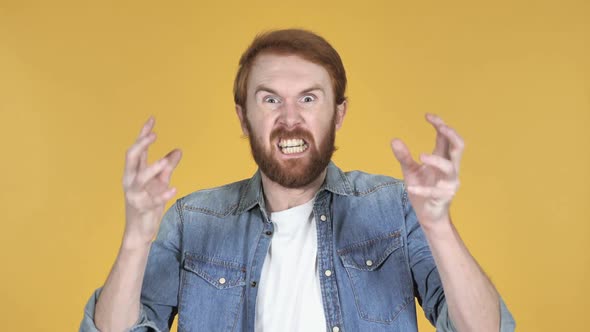 Screaming Angry Redhead Man Yellow Background