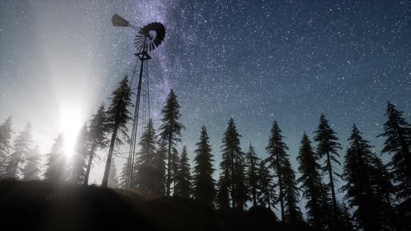 Retro Windmill in Mountain Forest with Stars. Hyperlapse alt