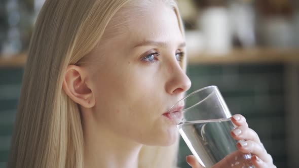 Healthy Young Lady Holding Glass Drinking Fresh Transparent Pure Filtered Mineral Water