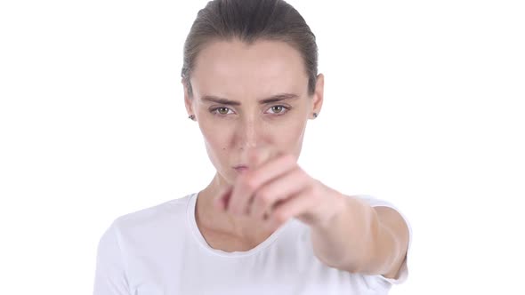 Woman Pointing at Camera in Office