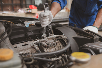 ing in for repair at the center. Professional engine specialist, car repair, car breakdown. Car maintenance and repair concept.
