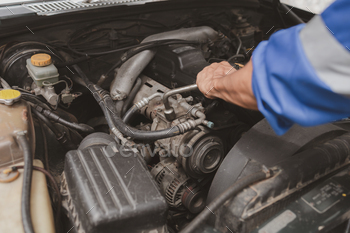 ing in for repair at the center. Professional engine specialist, car repair, car breakdown. Car maintenance and repair concept.