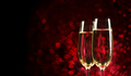 Two champagne glasses on sparkling red bokeh background. Christmas and new year holiday party. - PhotoDune Item for Sale