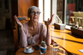 Mature woman in cafe - PhotoDune Item for Sale
