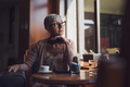 Mature woman in cafe - PhotoDune Item for Sale