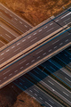 Aerial shot of empty freeway overpass with multiple lane highway asphalt road from drone pov - PhotoDune Item for Sale