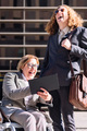 man and business woman laughing looking a tablet - PhotoDune Item for Sale