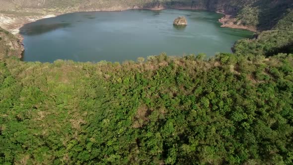 Aerial view of tall volcanic lake in Talisay, Philippines.