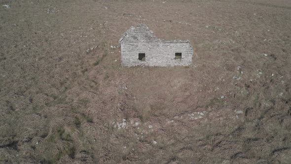 Neglected stone cottage Wicklow mountains Ireland aerial