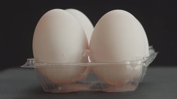 Row Of fresh White Duck Eggs In The Cells Egg Storage Box Rotating