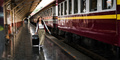 Young woman with suitcase for tourist adventure holiday traveling with a train.concept transport - PhotoDune Item for Sale