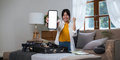 Cheerful woman advertisement using mobile phone blank white screen display frameless modern design - PhotoDune Item for Sale