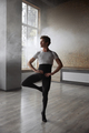 Confidence male ballet dancer practicing alone in studio room - PhotoDune Item for Sale