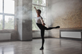 Confidence male ballet dancer practicing alone in studio room - PhotoDune Item for Sale